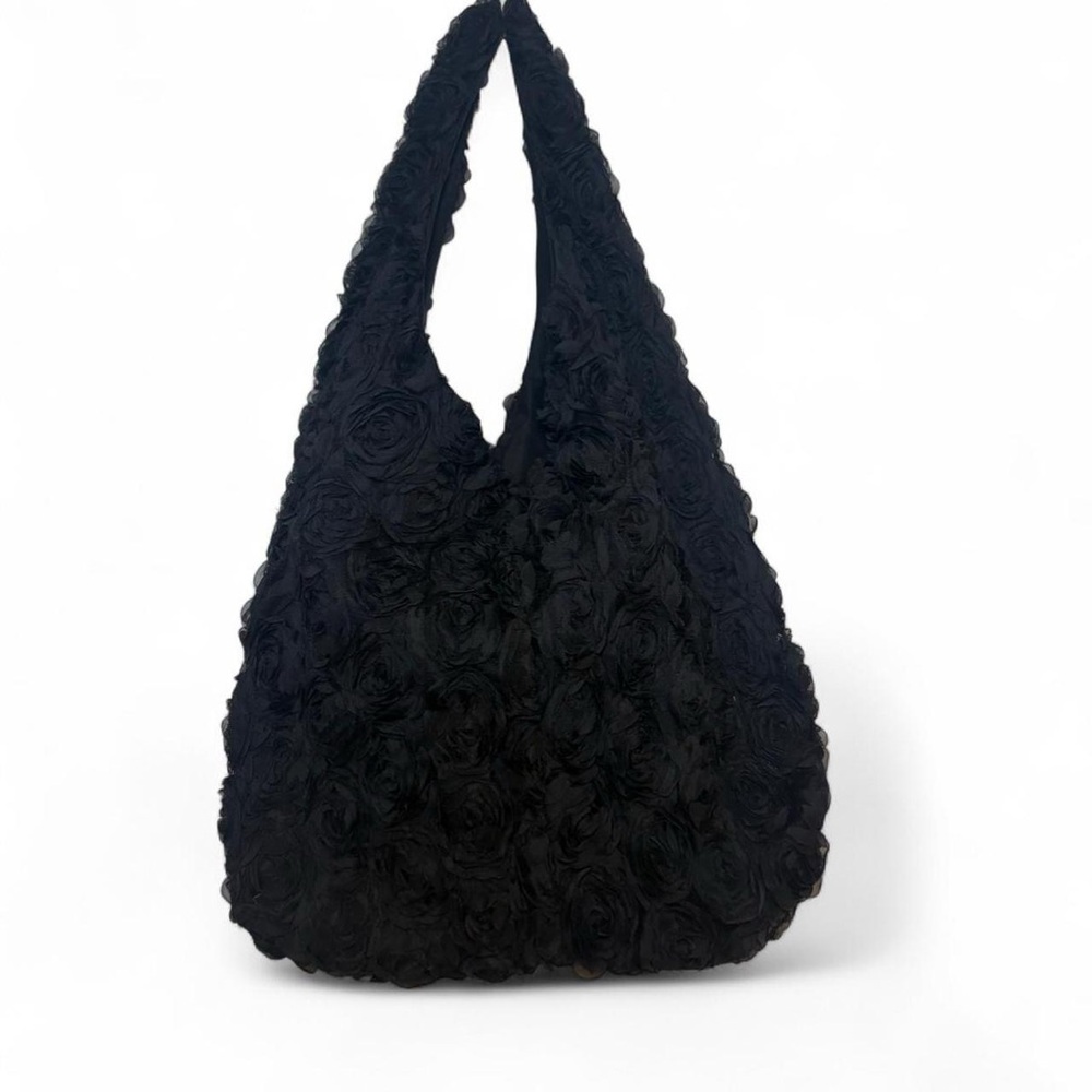 Motta black handbag covered with rosettes